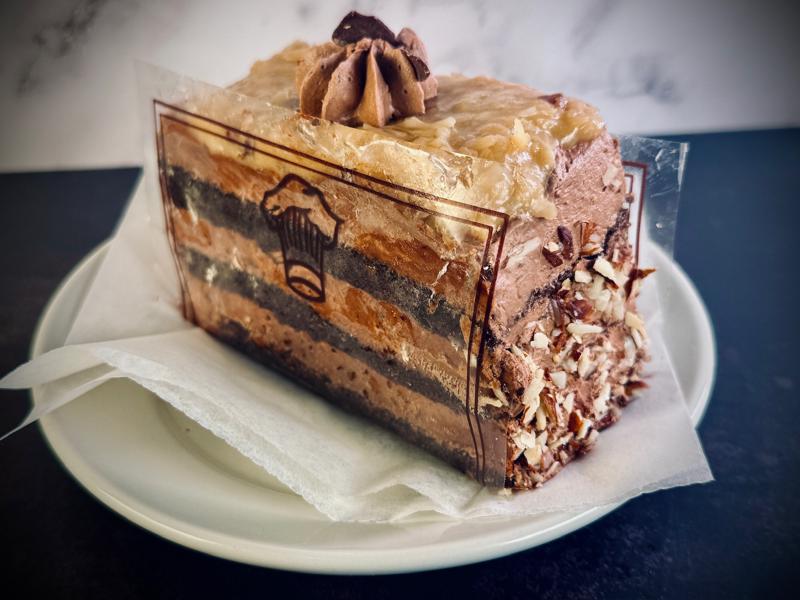 Rich chocolate layer cake slice