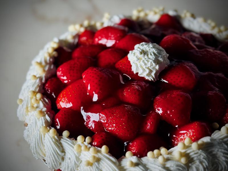 Fresh strawberry cake with whipped cream