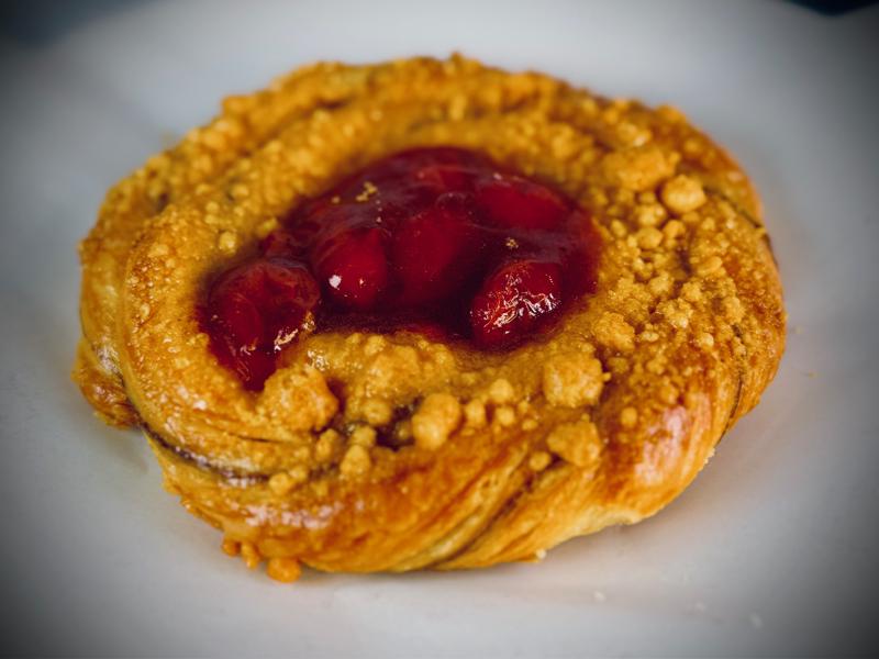 Cherry Danish pastry with sweet glaze