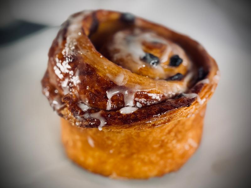 Glazed cinnamon roll with sweet icing